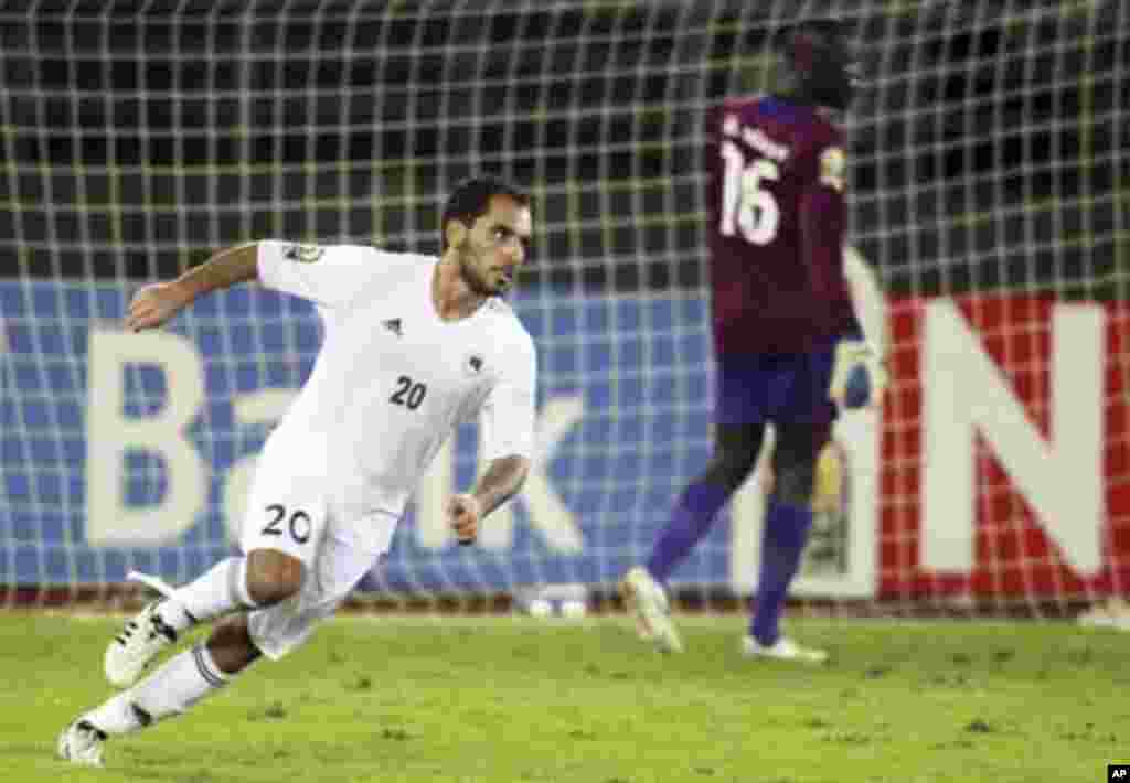 Libya's Ihab Al Bouseffi celebrates after scoring a goal against Senegal during their African Nations Cup Group A soccer match at Estadio de Bata "Bata Stadium", in Bata January 29, 2012.