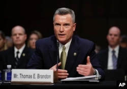 Thomas Brandon, acting director of the Bureau of Alcohol, Tobacco, Firearms and Explosives, testifies during a Senate Judiciary Committee hearing on Capitol Hill in Washington, Dec. 6, 2017. He said he expects his agency to regulate bump-stock devices and could end up banning them.