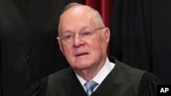 FILE - Supreme Court Associate Justice Anthony M. Kennedy joins other justices of the U.S. Supreme Court for an official group portrait at the Supreme Court Building in Washington.