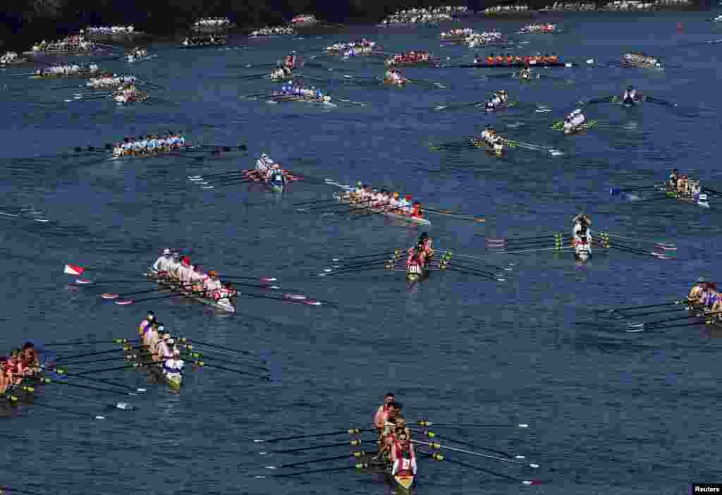 Crews gather at the start of the Head of the River Race, an annual rowing race dating back to 1926 where several hundred British and international rowing crews compete to be the fastest over a 4.25 mile (6.8 kilometre) course along the River Thames in London, March 30, 2019.