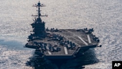 Foto de archivo del USS Harry S. Truman que se vio amenazado por las pruebas misilísticas de Irán en el Estrecho de Ormuz.