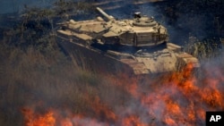 Tenk u Siriji zahvaćen požarom posle napada opozicionih snaga