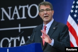 FILE - U.S. Secretary of Defense Ash Carter speaks at a news conference during a NATO Defence Ministers meeting at the Alliance's headquarters in Brussels, Feb. 11, 2016.