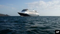 The Zaandam cruise ship is anchored in the bay of Panama City, Friday, March 27, 2020. 