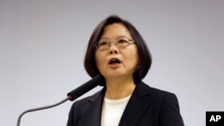 Taiwan's President-elect Tsai Ing-wen, announces that Lin Chuan is her choice for premier at their Democratic Progressive Party headquarters in Taipei, Taiwan, Tuesday, March 15, 2016. 