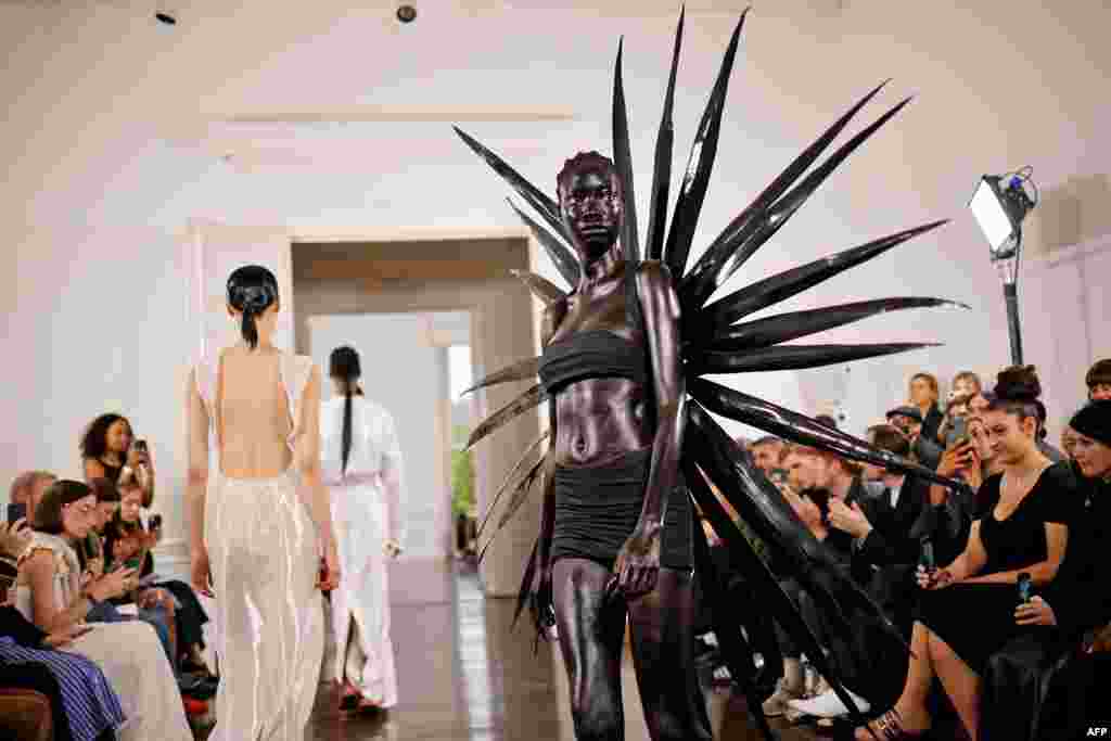 Models presents creations for Fashion East during the Spring/Summer 2022 collection show on the fourth day of London Fashion Week.