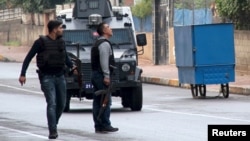 FILE - Turkish police special forces take part in a security operation in Diyarbakir, Turkey, October 26, 2015, where two Turkish policemen and seven Islamic State militants were killed after police raided more than a dozen houses in the region. 