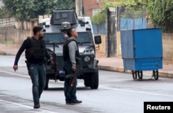 FILE - Turkish police special forces take part in a security operation in Diyarbakir, Turkey, October 26, 2015, where two Turkish policemen and seven Islamic State militants were killed after police raided more than a dozen houses in the region.