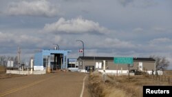 A Canadian customs building is seen from the United States Border Station Port of Willow Creek on the international border in Montana, United States, Nov. 20, 2015. 