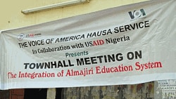 Poster outside VOA Town Hall meeting in Kano.