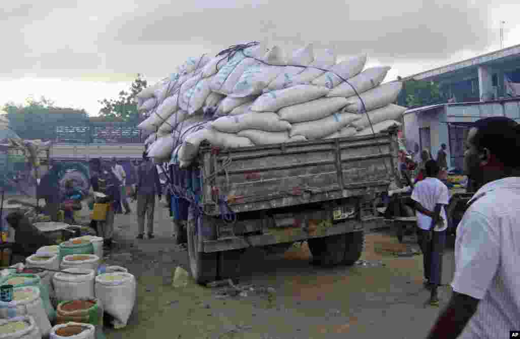 SOMALIA: Even stolen food aid is delayed by bad roads near the capital of Somalia as in this photograph taken by AP on Aug. 8, 2011.
