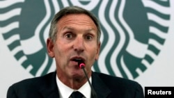 Starbucks Chairman and CEO Howard Schultz speaks during a news conference at a hotel in Bogota, Aug. 26, 2013.