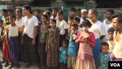 FILE - Muslim Rohingya residents of the Aung Minglar neighborhood are seen in Sittwe, Myanmar, June 4, 2015. (Colin Lovett/VOA)