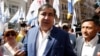 Mikhail Saakashvili, former Georgian president and former governor of the Ukrainian Odessa region, is surrounded by his supporters at a rally near the Justice Ministry in Kyiv, Ukraine, May 30, 2017. Saakashvili was stripped of his Ukrainian citizenship Wednesday.