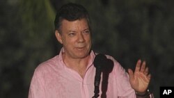 Colombia's President Juan Manuel Santos talks to the press in Cartagena, Colombia, Nov. 4, 2011.