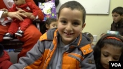 The gift he received put a big smile on this Syrian boy's face.