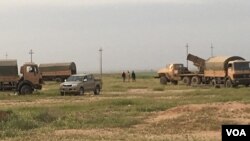 Vehicle-based rocket launching system positioned just behind combined Iraqi and Kurdish Peshmerga frontline at Makhmour, March 24, 2016. (S. Behn / VOA) 
