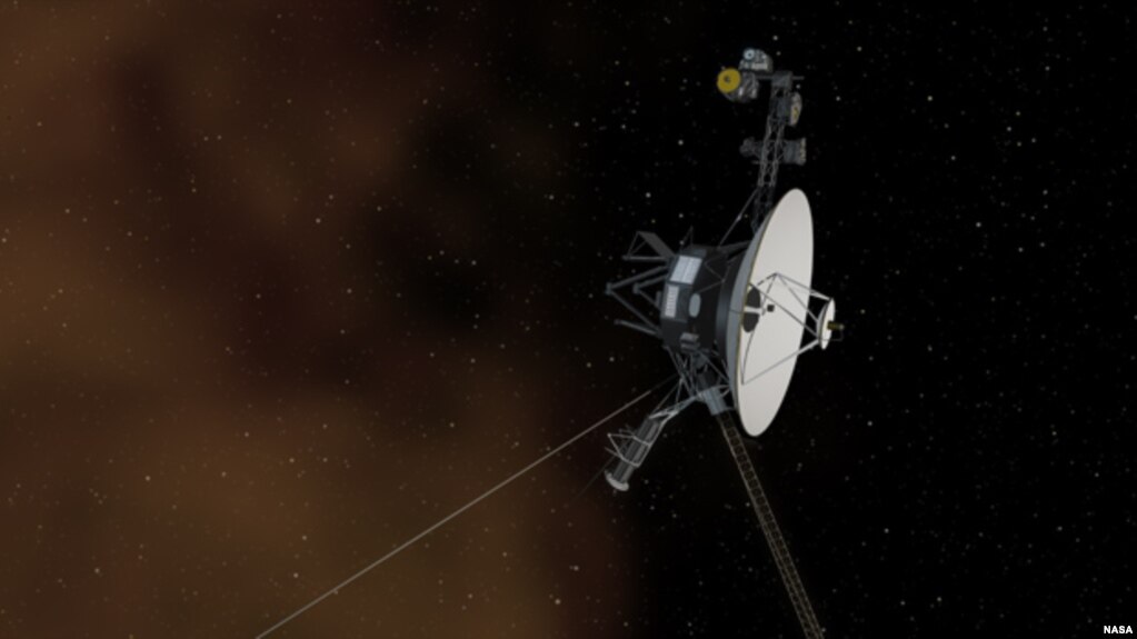 This artist's concept shows the Voyager 1 spacecraft entering the space between stars. Interstellar space is dominated by plasma, ionized gas (illustrated here as brownish haze), that was thrown off by giant stars millions of years ago. (NASA/JPL-Caltech)