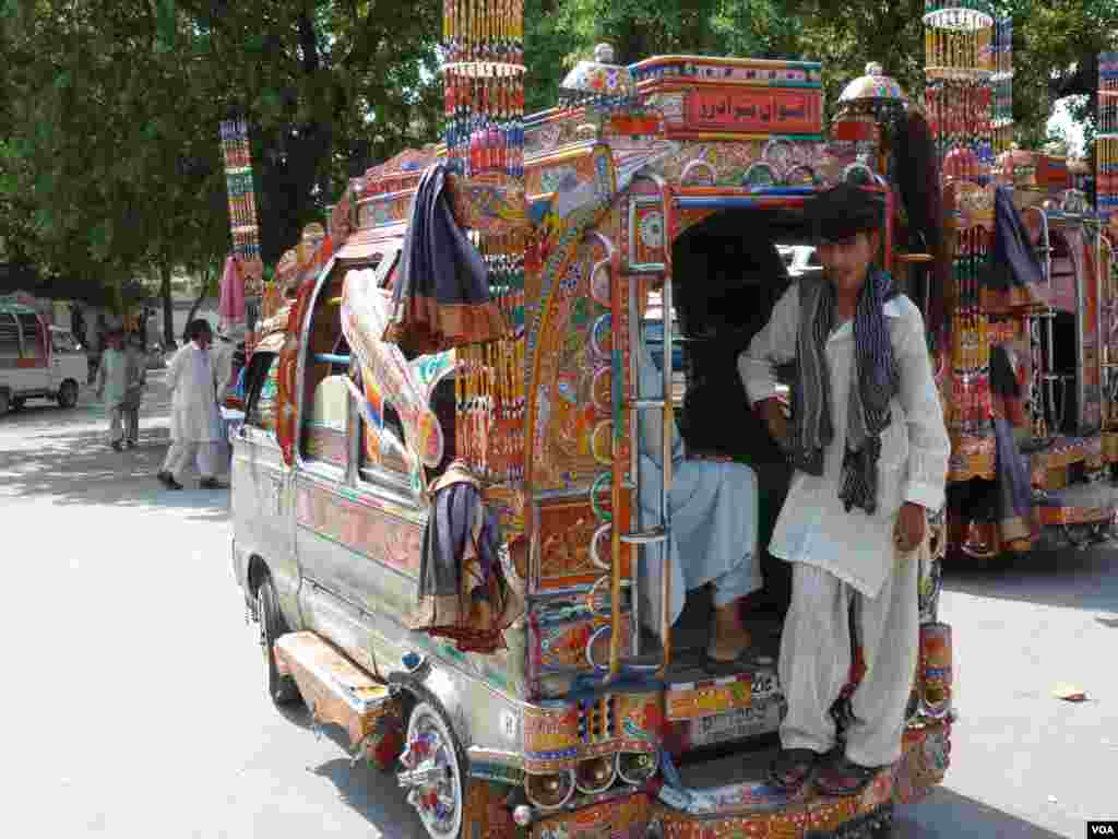 A heavily-decorated bus in Islamabad, Pakistan, July 10, 2012. (S. Gul/VOA)