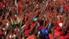 Followers of the Economic Freedom Fighters attend rally for South Africa's May 7 elections. The new party appeals to disgruntled supporters of the ruling African National Congress (ANC). 