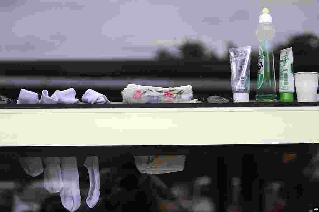 Toiletries and socks sit on a ledge at an evacuee center for leaked radiation from the damaged Fukushima nuclear facilities, March 21, 2011.