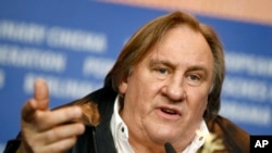 FILE: Actor Gerard Depardieu addresses the media during the press conference for the film 'Saint Amour' at the 2016 Berlinale Film Festival in Berlin, Germany, on Fri. Feb. 19, 2016.