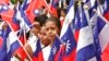 FILE - Students holding Taiwanese and Nicaraguan flags take part in a farewell ceremony for Taiwan's President Chen Shui-bian, in Managua, Nicaragua, Aug. 28, 2007.