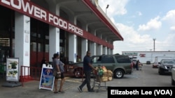 Shoppers stock up on groceries and bottled water at Fiesta Grocery store in southwest Houston at Bellaire Blvd. and South Gessner Road.