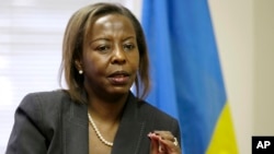 Rwandan Foreign Minister Louise Mushikiwabo gestures during an interview with The Associated Press at the Rwandan Embassy in Washington, (File photo).