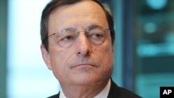 President of the European Central Bank Mario Draghi attends the Committee on Economic and Monetary Affairs at the European Parliament in Brussels, July 9, 2012.