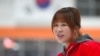 Former North Korean ice hockey player Hwangbo Young coaches an ice hockey class for children at an ice rink in Seoul, South Korea, April, 4, 2017.