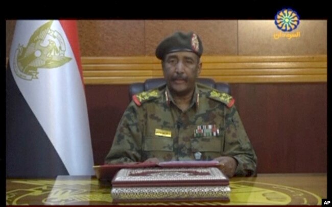 Image from video provided by Sudan TV, shows Lieutenant General Abdel-Fattah Burhan, head of the Sudanese Transitional Military Council, TMC, making a broadcast announcement in Khartoum, Sudan, June 4, 2019.