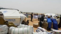Des réfugiés maliens