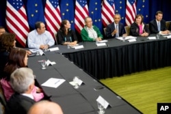 President Barack Obama, third from right, participates in a roundtable with Alaska natives at Dena’ina Civic and Convention Center, Aug. 31, 2015, in Anchorage, Alaska.