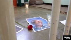 Nelson Mandela's former prison cell on Robben Island, South Africa, Dec. 14, 2013. Henry Ridgwell for VOA.