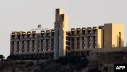 FILE - The five-star Zaver Pearl Continental hotel is seen on a hill in the southwestern Pakistani port city of Gwadar, March 8, 2019.