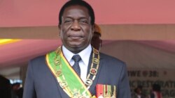 FILE: Zimbabwe's President Emmerson Mnangagwa prepares to inspect the guard of honour at the National Sports Staduim in Harare, Wednesday, April, 18, 2018, during the celebrations for the country's 38th anniversary of Independence. 