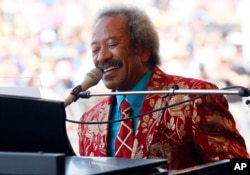 FILE - Allen Toussaint performs at the New Orleans Jazz and Heritage Festival in New Orleans, Louisiana, May 7, 2011.