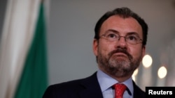 FILE - Mexican Foreign Secretary Luis Videgaray speaks with reporters at the State Department in Washington, Aug. 30, 2017. 