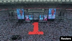 Indonesia's incumbent presidential candidate addresses to supporters during a campaign rally at Gelora Bung Karno stadium in Jakarta, Indonesia, April 13, 2019 in this photo taken by Antara Foto. 