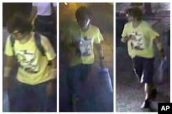 This Aug. 17, 2015, image, released by Royal Thai Police spokesman Lt. Gen. Prawut Thavornsiri shows a man wearing a yellow T-shirt near the Erawan Shrine before an explosion occurred in Bangkok.