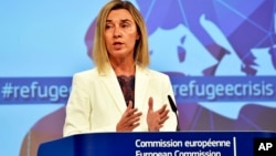 Kepala urusan luar negeri Uni Eropa, Federica Mogherini memberikan keterangan di Brussels, Belgia (23/9).
