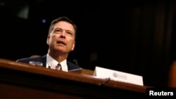 Former FBI Director James Comey testifies before a Senate Intelligence Committee hearing on Russia's alleged interference in the 2016 U.S. presidential election on Capitol Hill in Washington, June 8, 2017. 