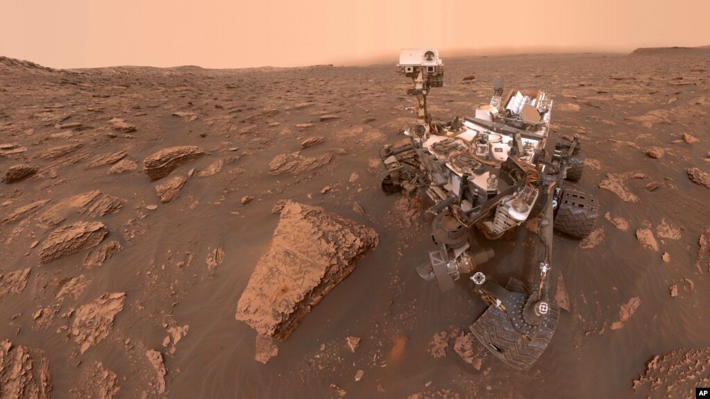 This composite image made from a series of June 15, 2018 photos shows a self-portrait of NASA's Curiosity Mars rover in the Gale Crater. (NASA/JPL-Caltech via AP)