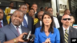 Nikki Haley, U.S. ambassador to the United Nations, center, meets with President of Congo's Election commission, Corneil Nangaa, left, during a meeting in Kinshasa, Congo, Oct. 27, 2017. 