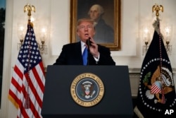 FILE - President Donald Trump speaks about Iran from the Diplomatic Reception Room at the White House in Washington, Oct. 13, 2017.