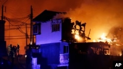 ချီလီနိုင်ငံ၊ Valparaiso ဆိပ်ကမ်းမြို့ မီးလောင်ကျွမ်းနေတဲ့မြင်ကွင်း။ (ဧပြီ ၁၃၊ ၂၀၁၄)