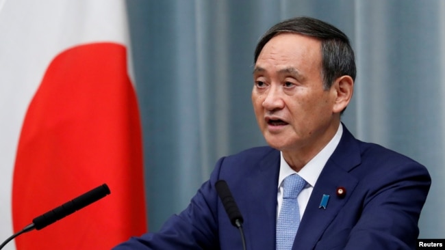 资料照:日本内阁官房长官菅义伟在记者会上讲话。(2019年9月11日)