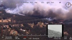 Foto udara menunjukkan kebakaran di kawasan Green Wattle Creek melintasi jalur kereta api dekat Balmoral, Wollondilly, New South Wales, Australia, 19 Desember 2019. (Foto: Medsos NSW Rural Fire Service via REUTERS)