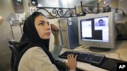 A young woman on the Internet in Iran.